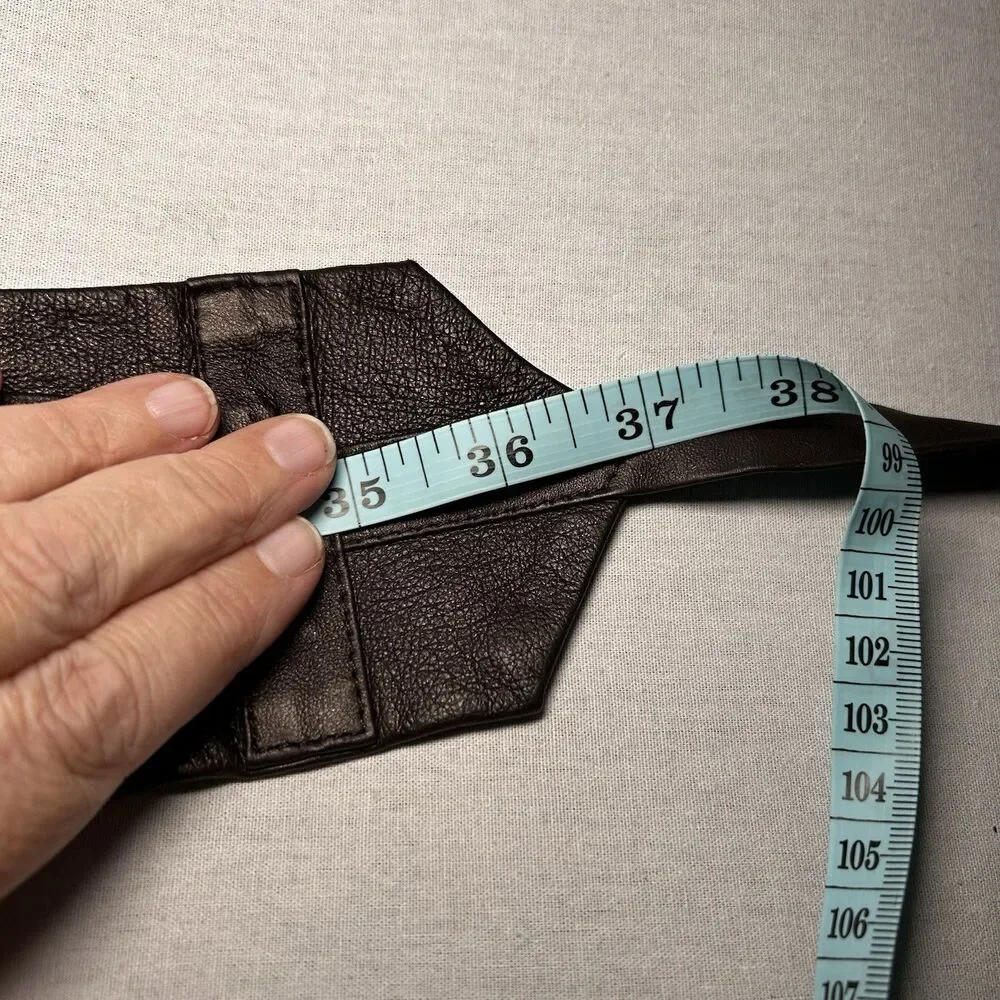 brown leather waist belt, featuring a wrap-around tie design